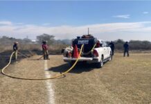 Incendio de zacatal pone en riesgo a joven futbolista